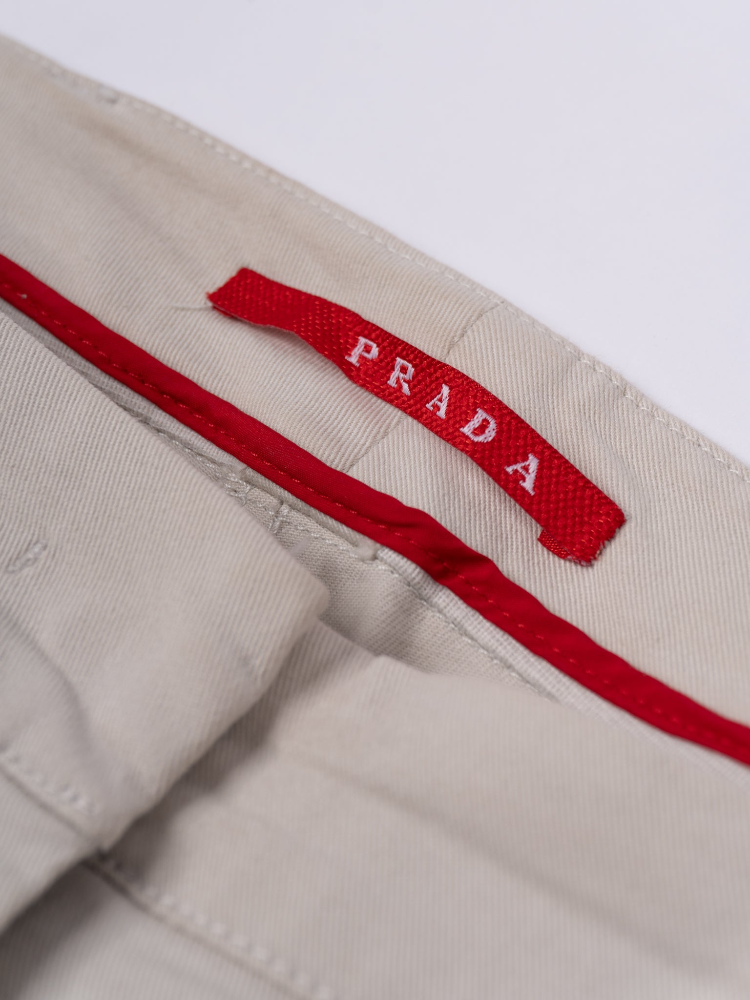 Pantalone chino Prada Linea Rossa